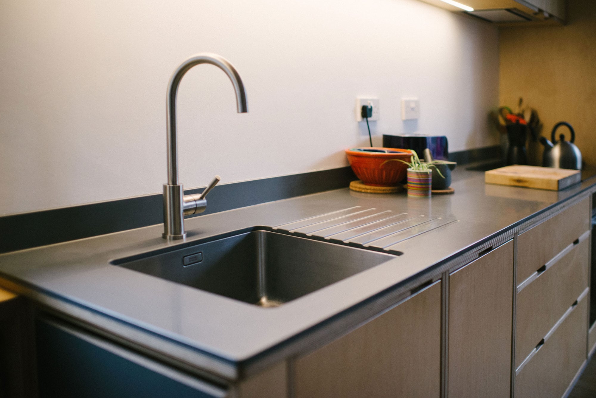 Natural birch ply and Silestone Sink.