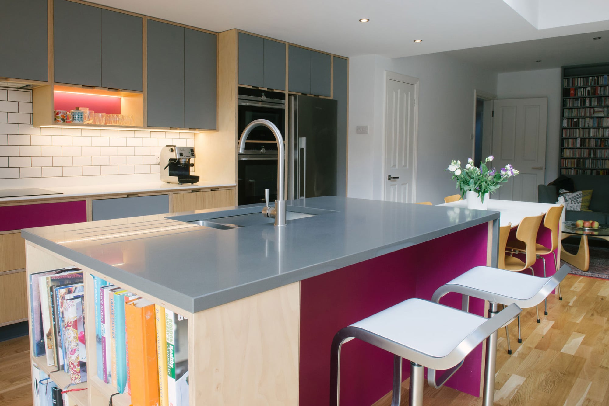 Pink and grey plywood kitchen