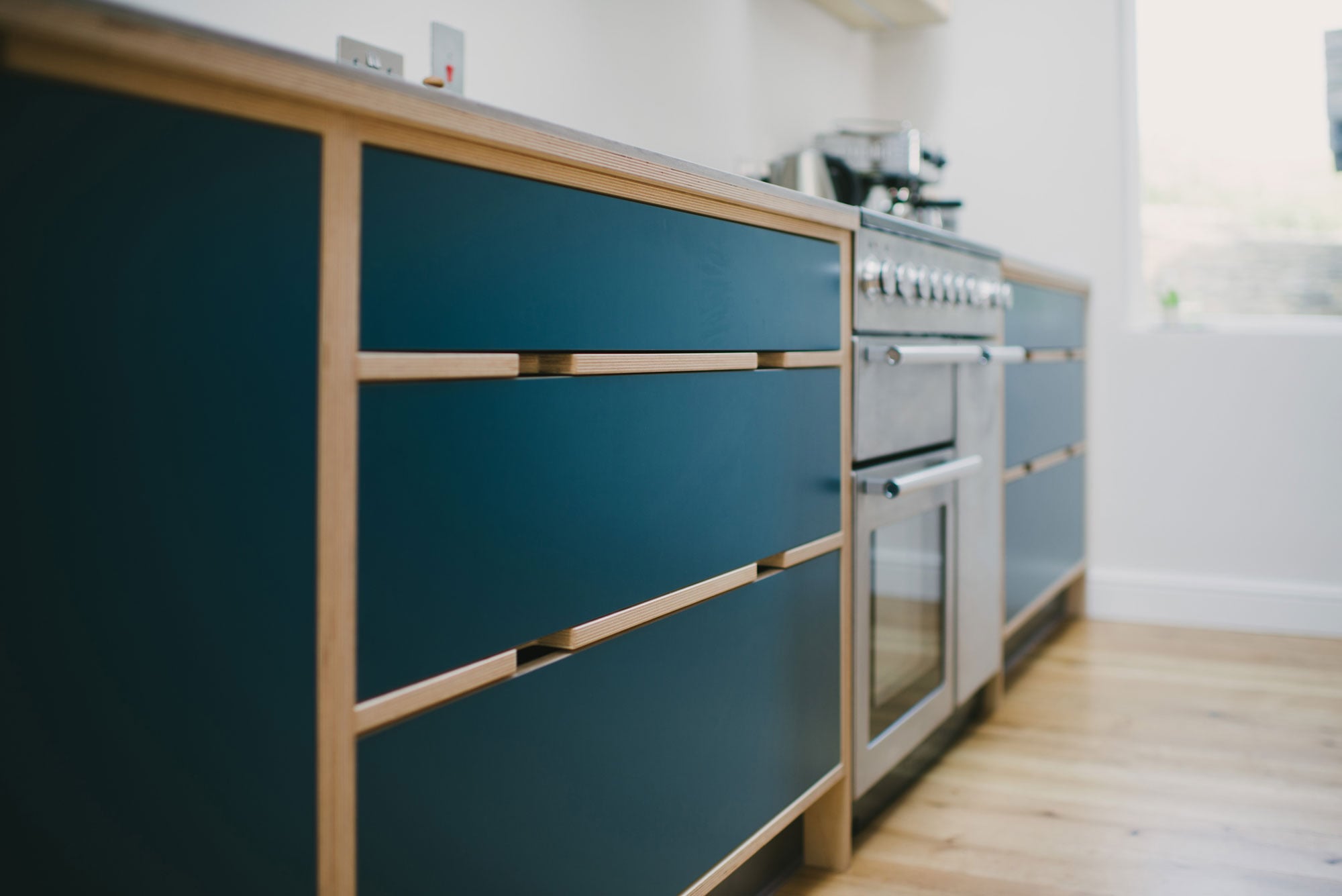 Drawer unit detail of plywood kitchen with Walnut kitchen island