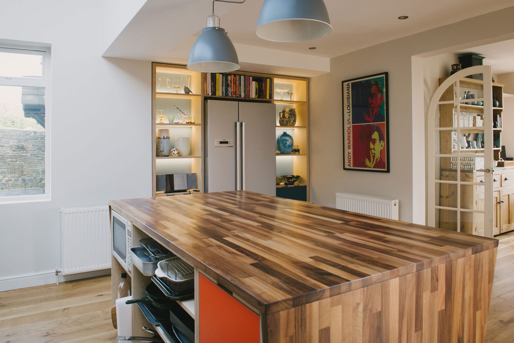 Walnut kitchen island in plywood kitchen