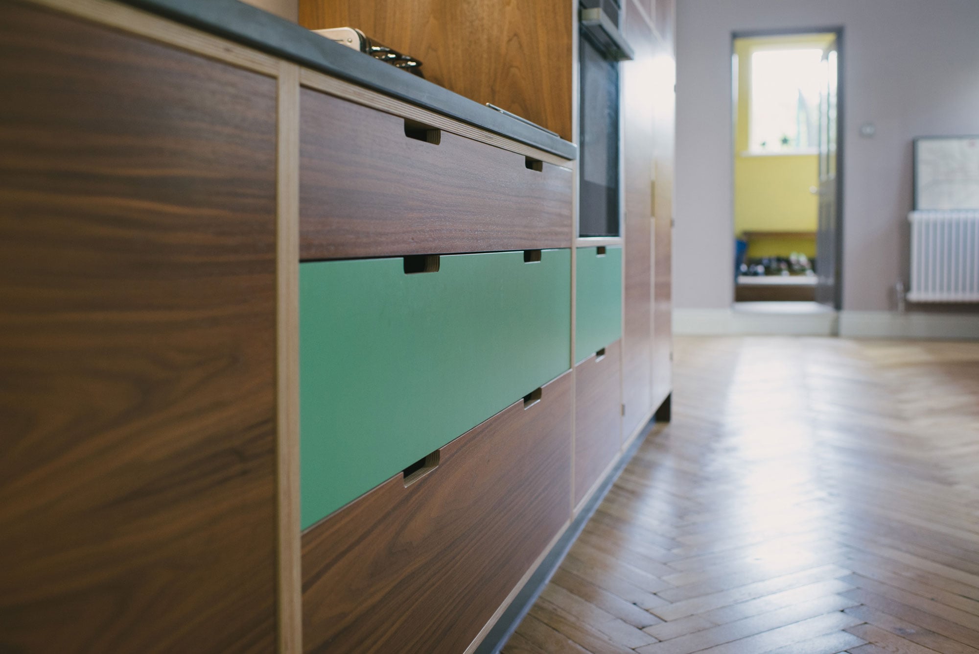 Walnut veneer kitchen island drawer detail