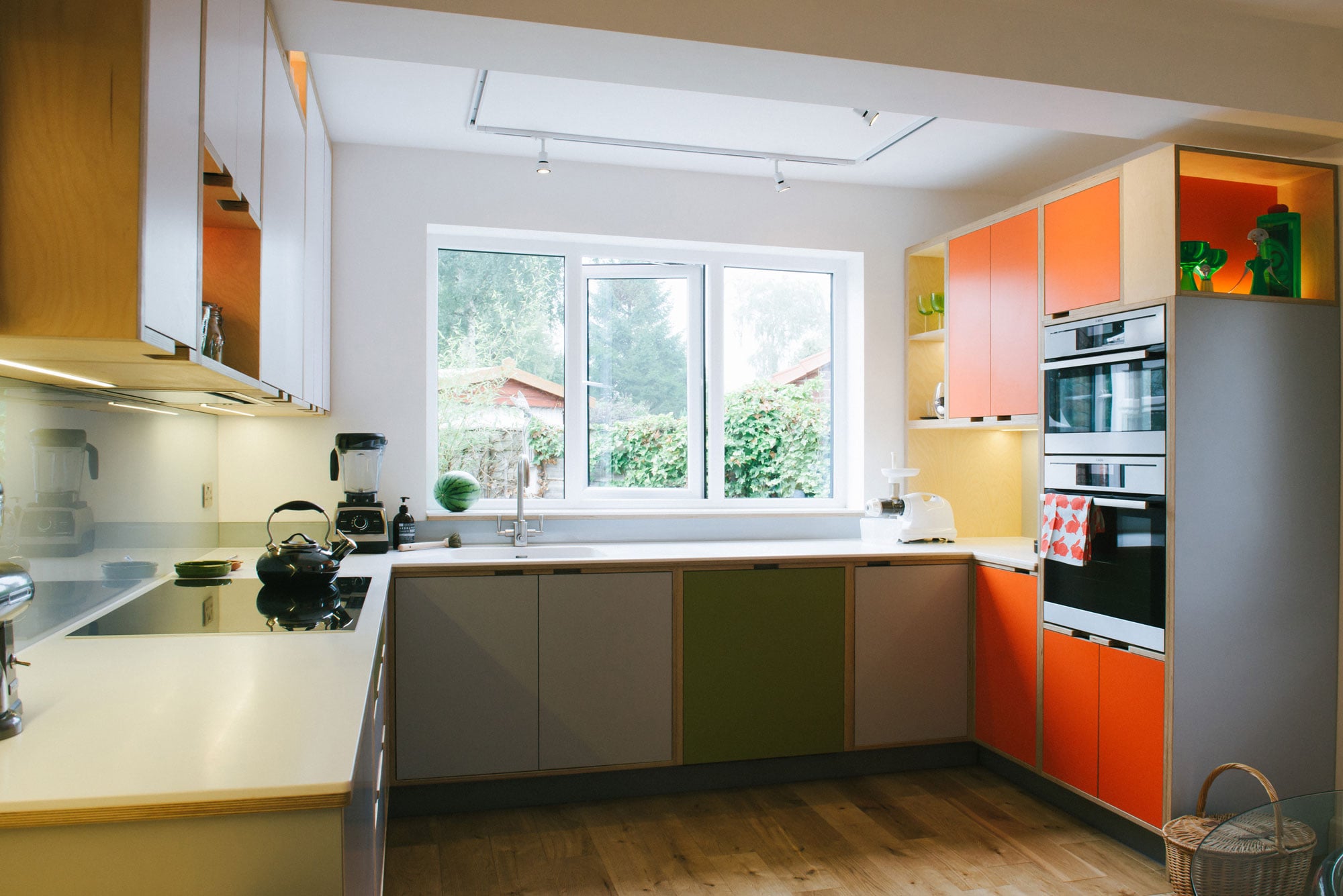Orange and green kitchen