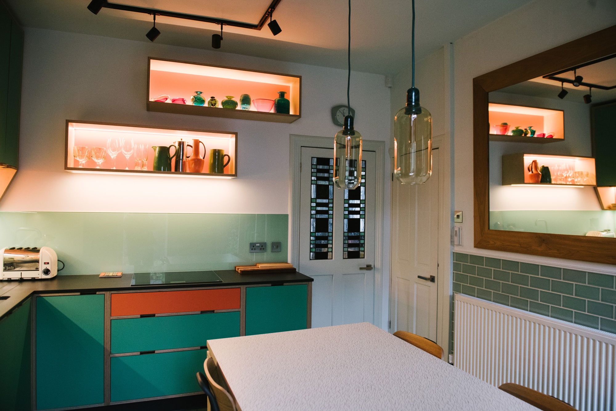 Illuminated Wall Shelving in 70's Style Plywood Kitchen