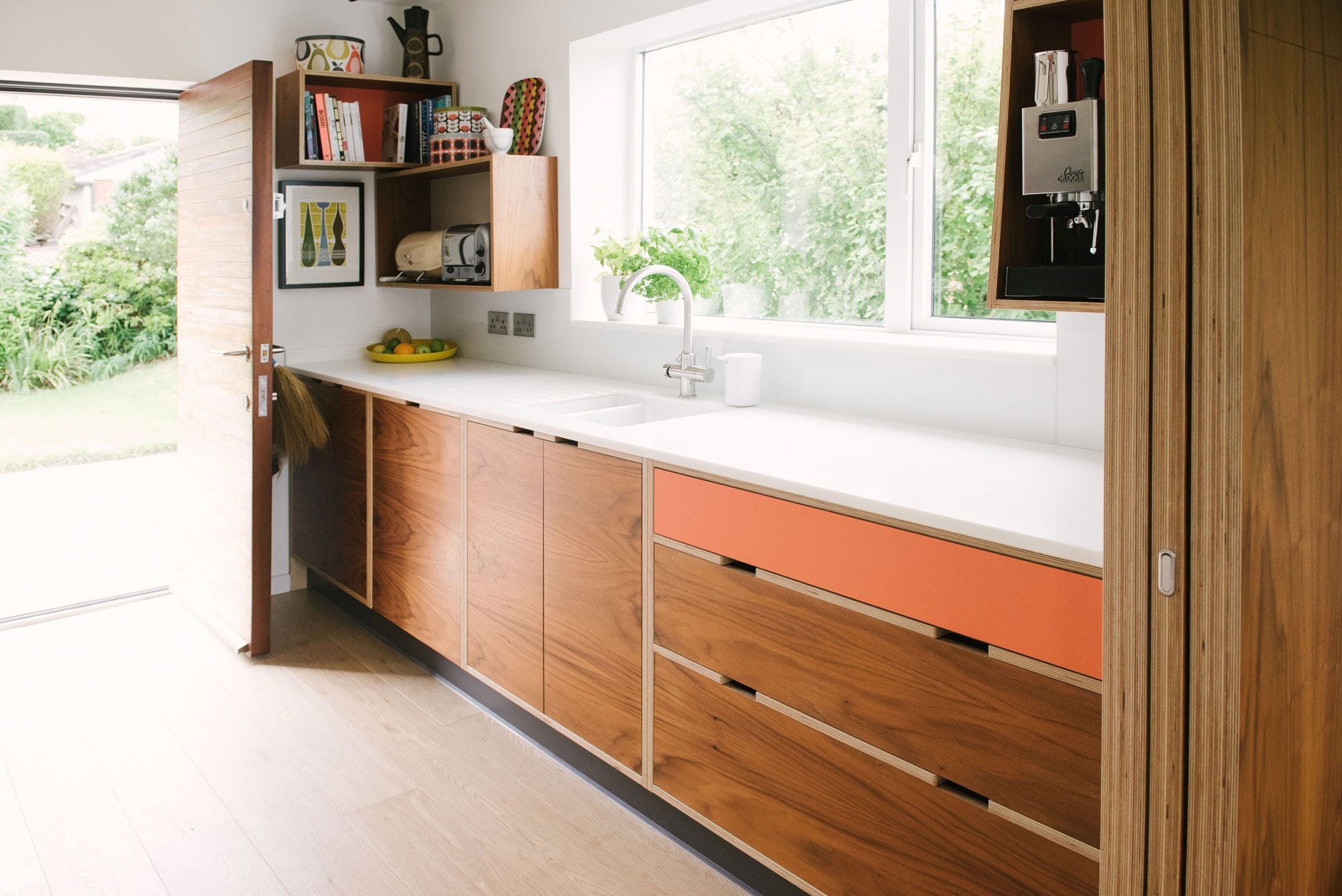 walnut and orange bespoke kitchen