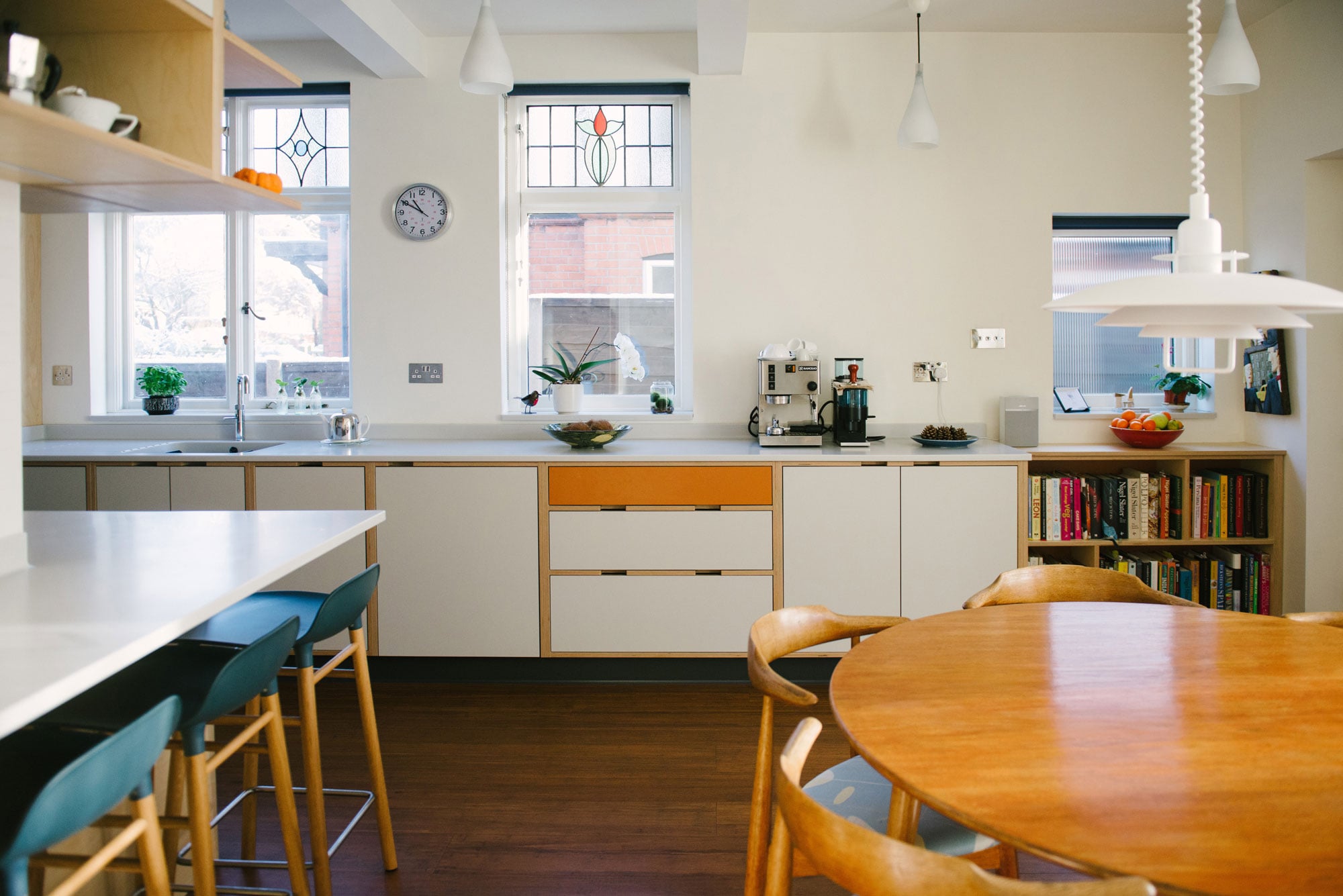 Orange and White Laminated Plywood Kitchen