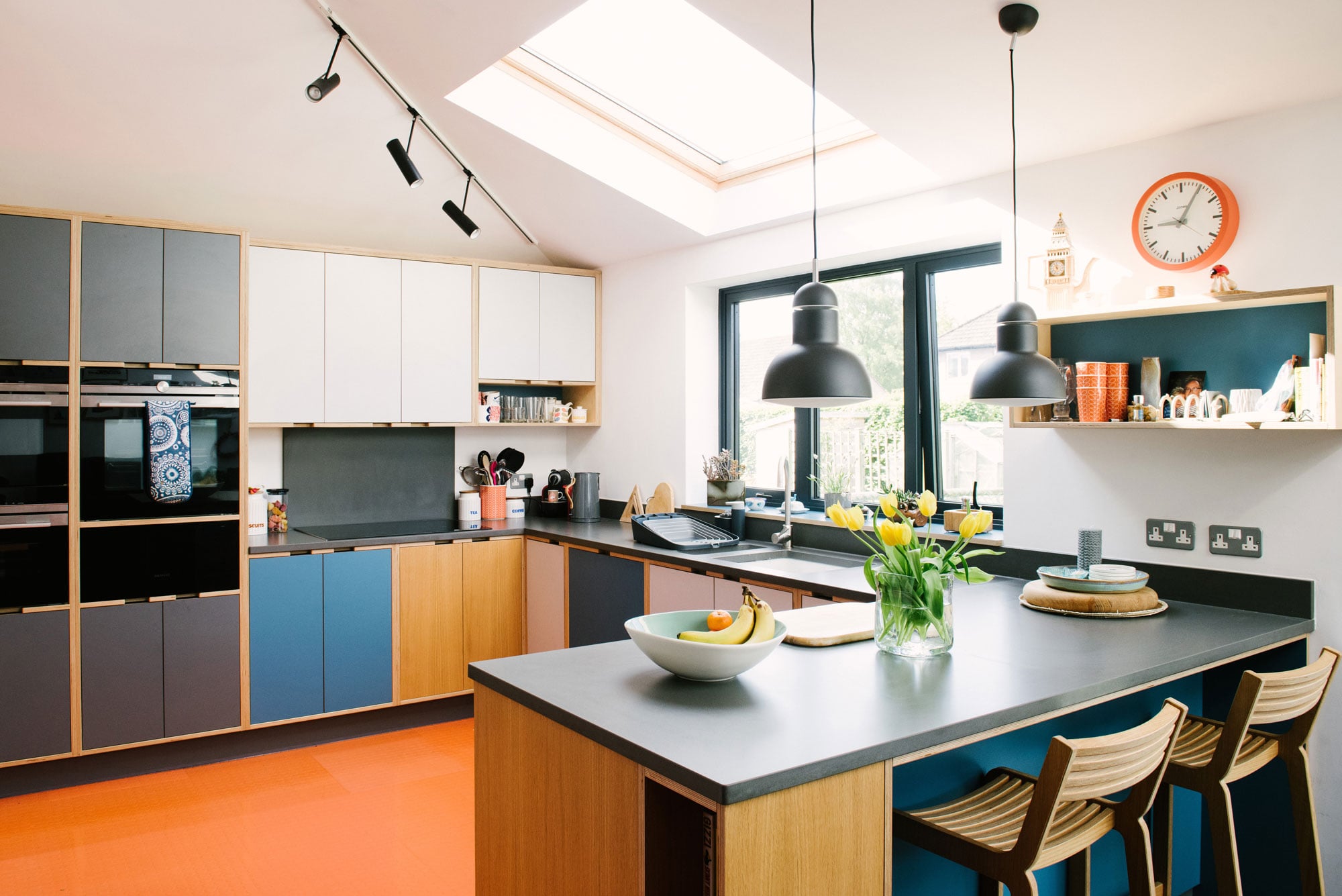 Plywood Kitchen With Orange Floor