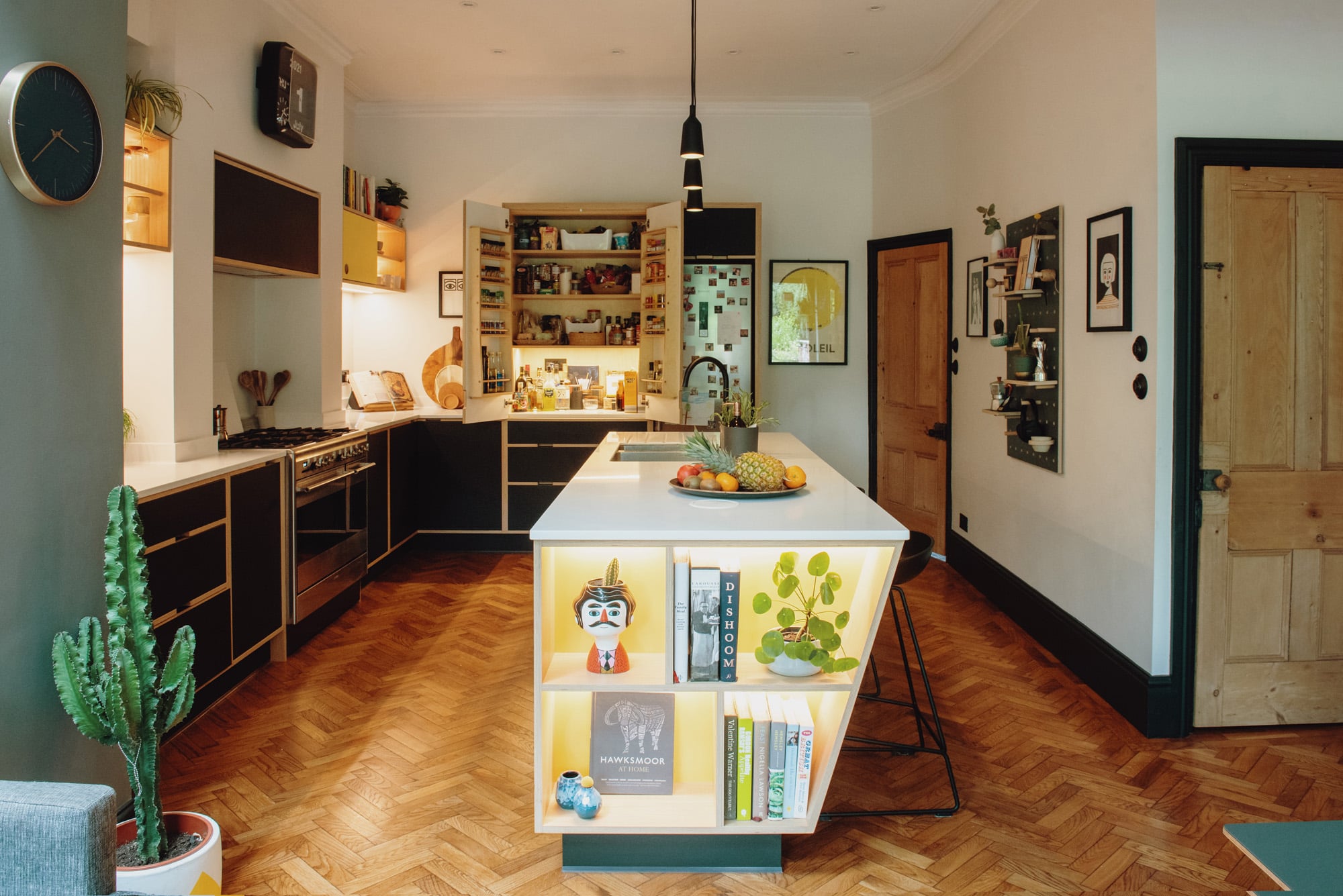 plywood kitchen with angled island unit