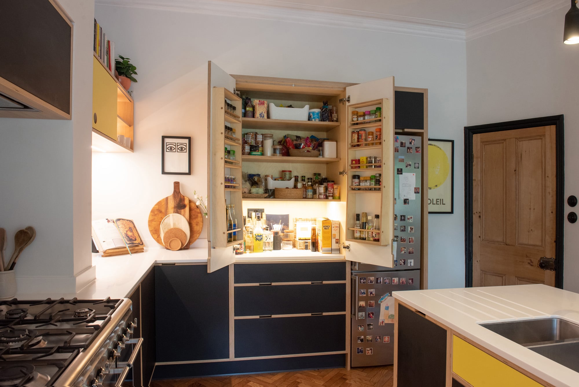 Kitchen larder unit open doors