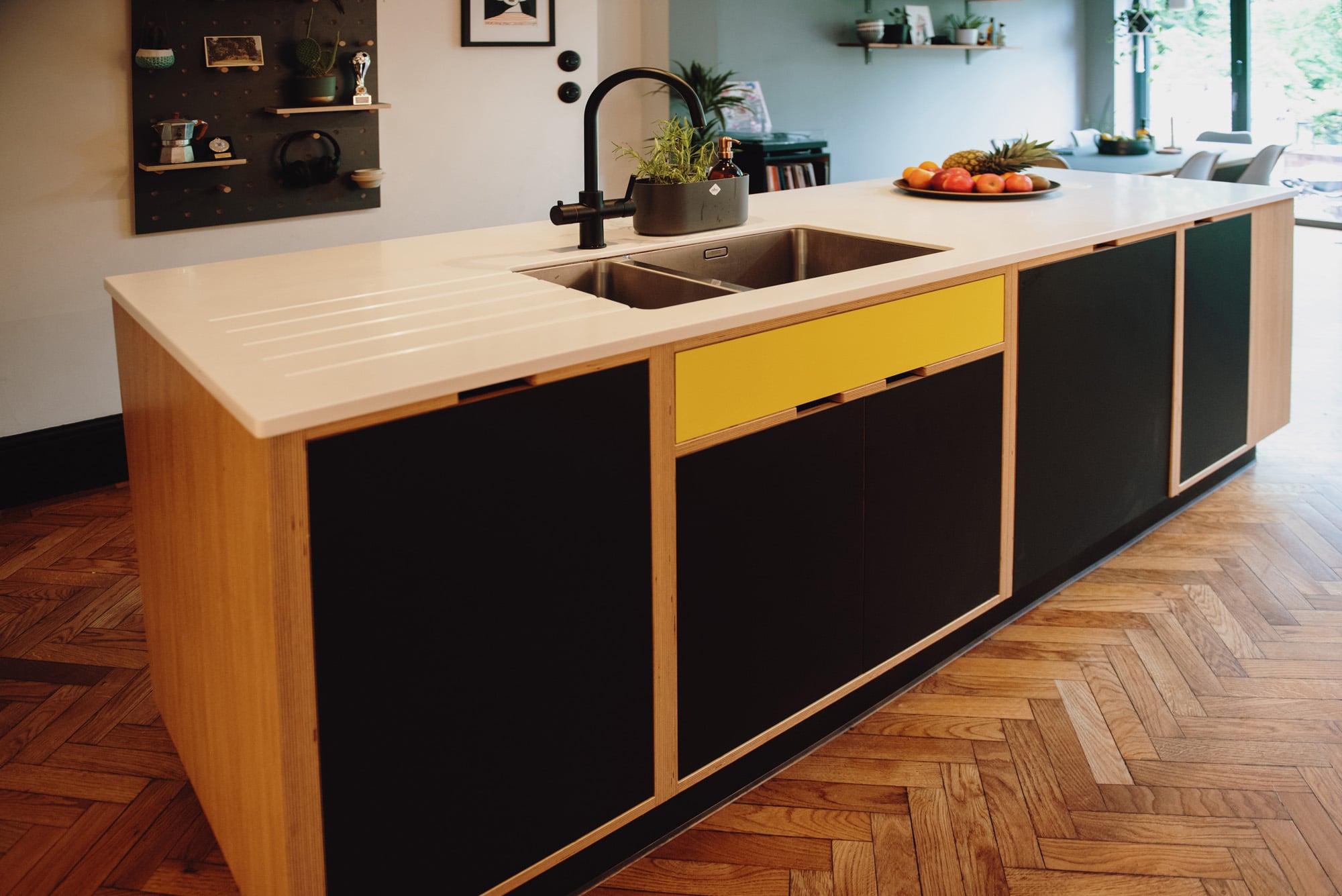 plywood kitchen base units in black and yello 