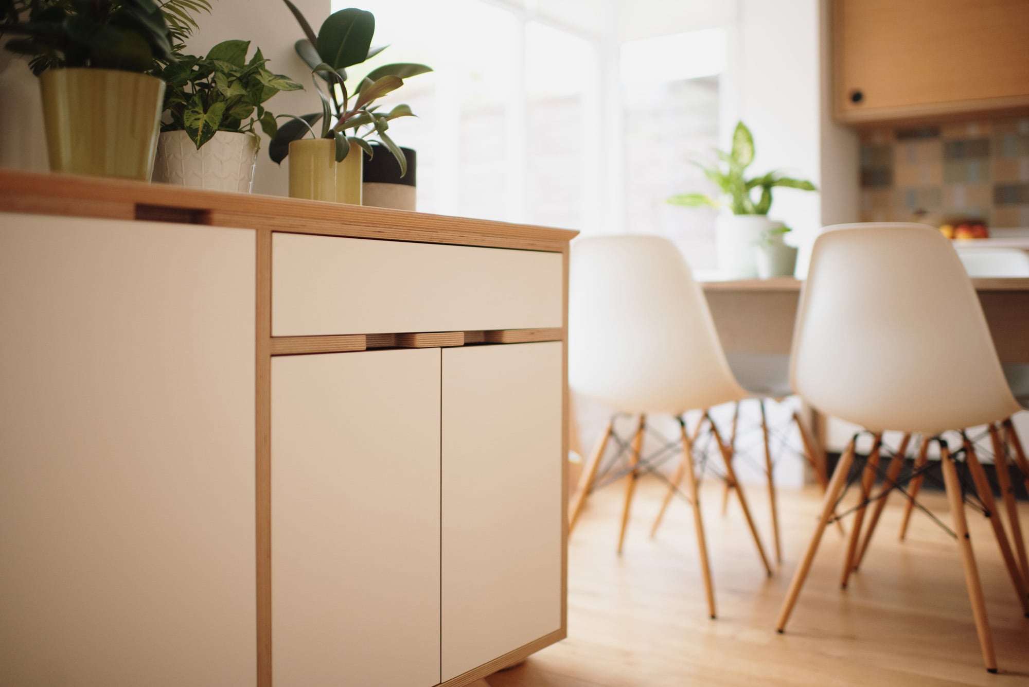 close up of white plywood sideboard