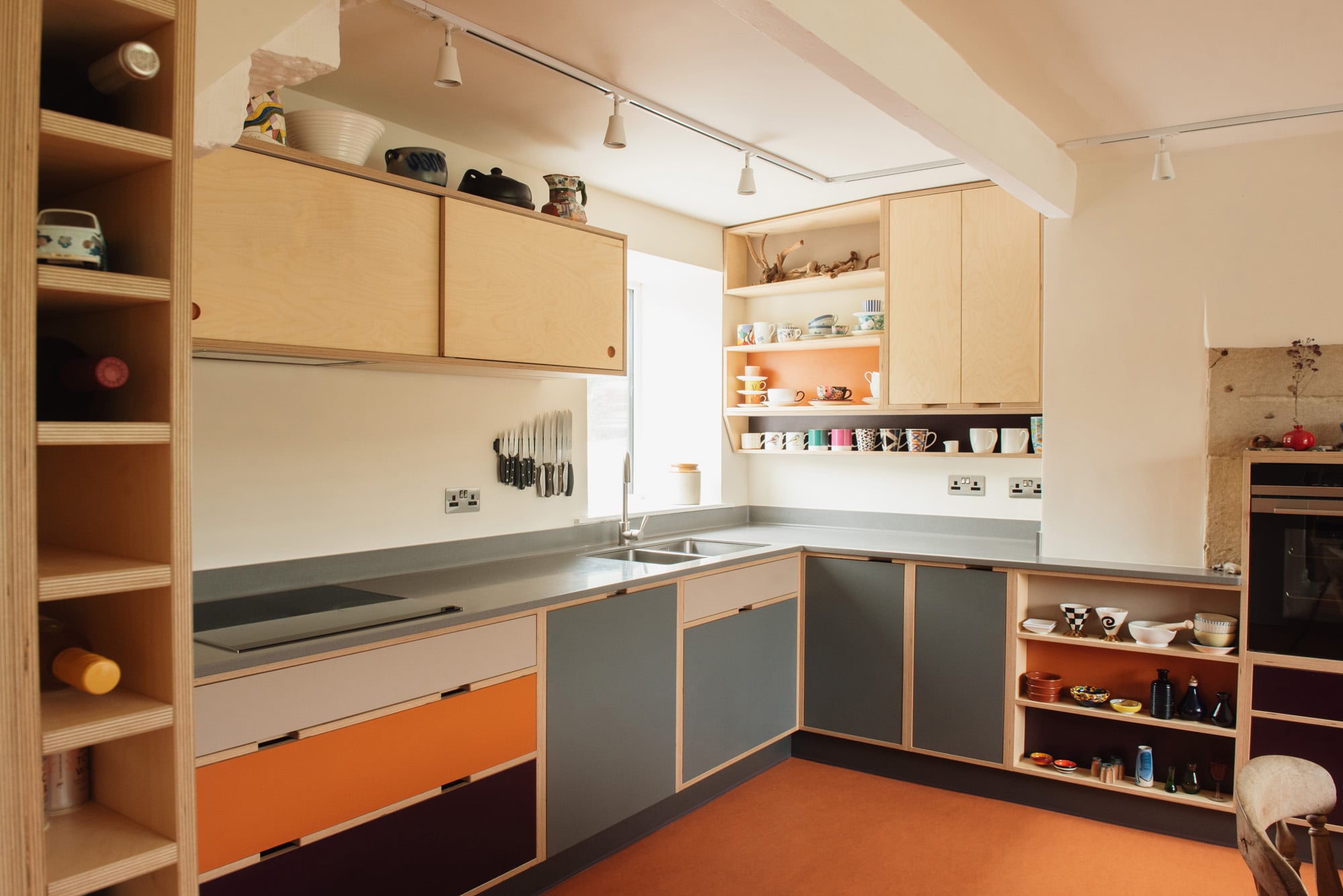sink area of multi coloured kitchen