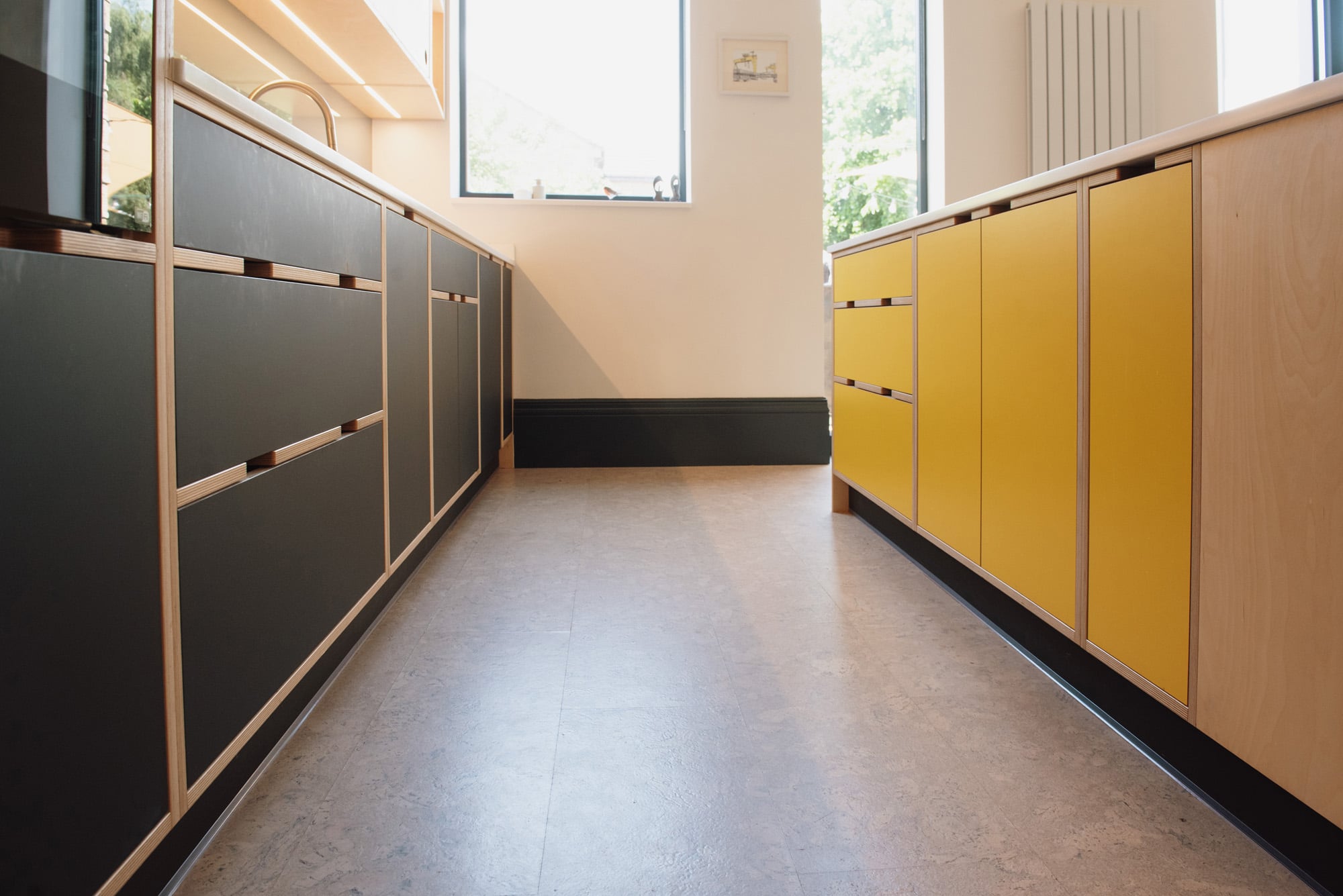 yellow and black kitchen base units 