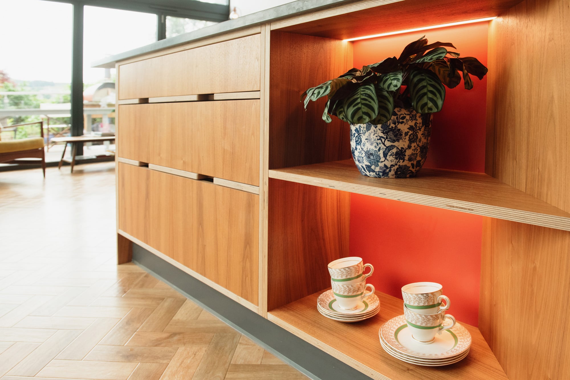 walnut veneered open shelving and drawers