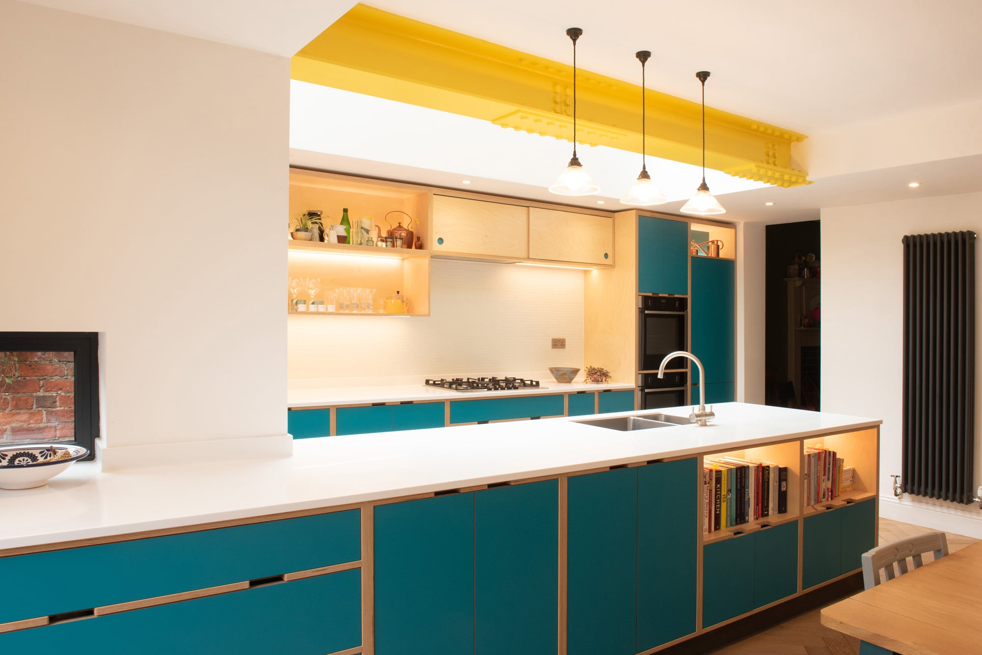 yellow and blue bespoke plywood kitchen