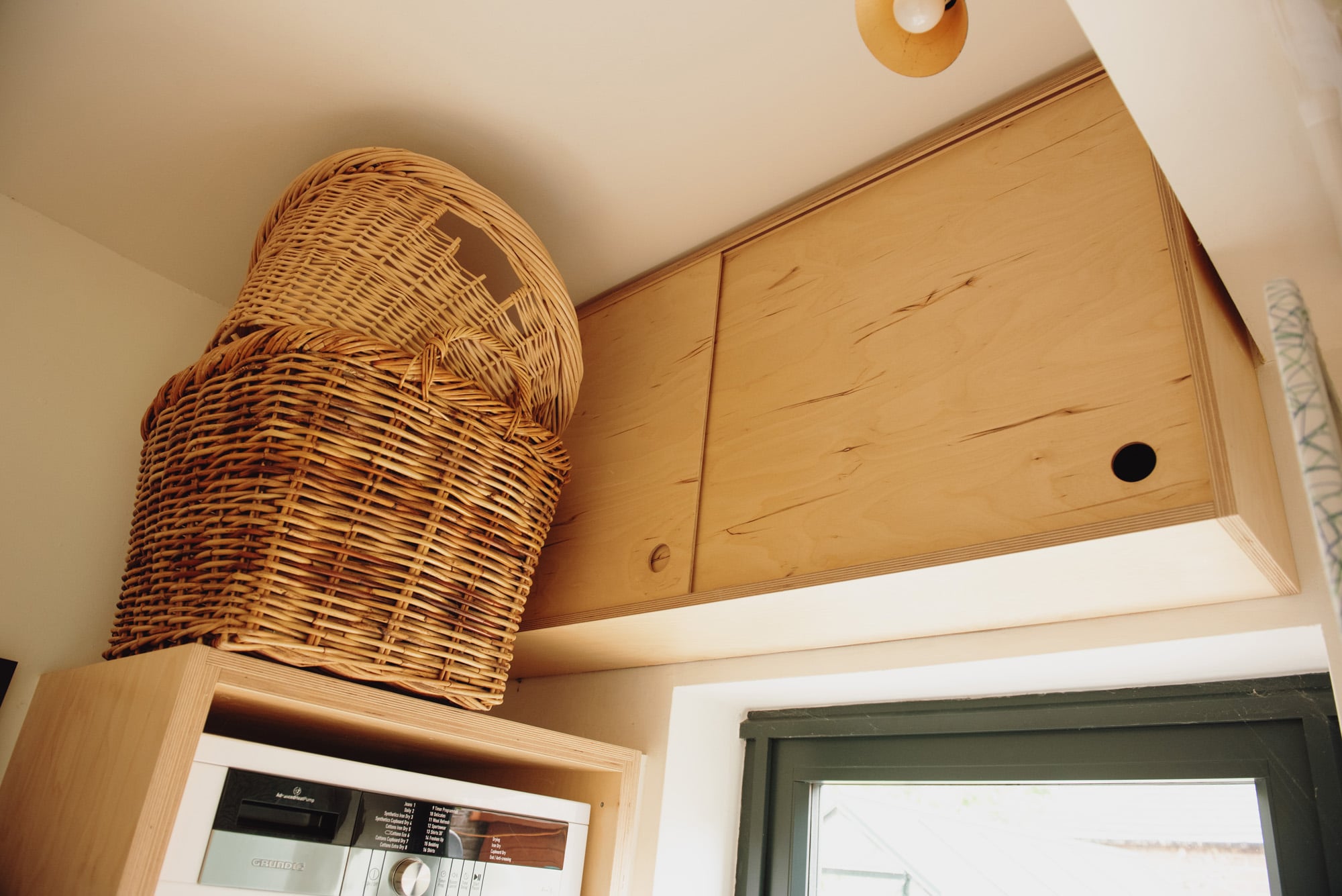 birch ply sliding cupboards over door