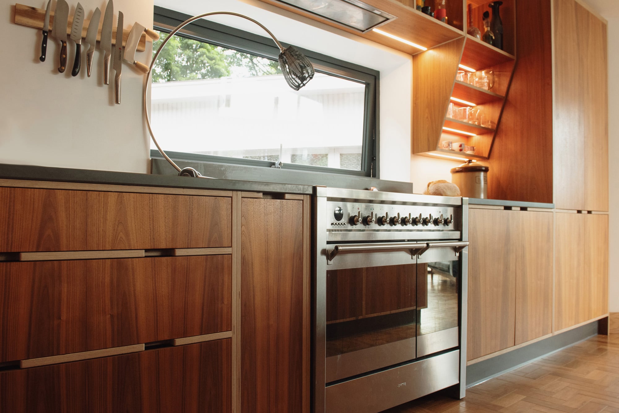 walnut kitchen with stainless steel range cooker