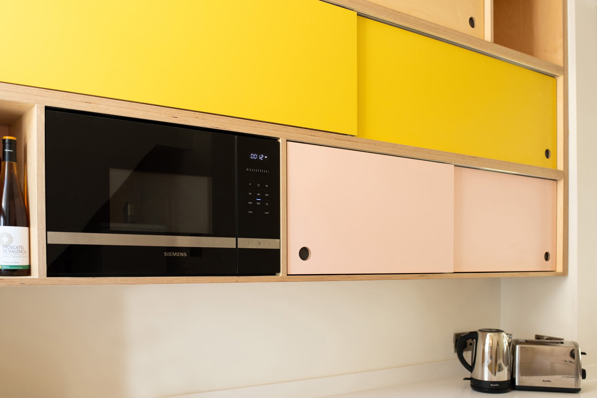 quirky yellow and pink kitchen