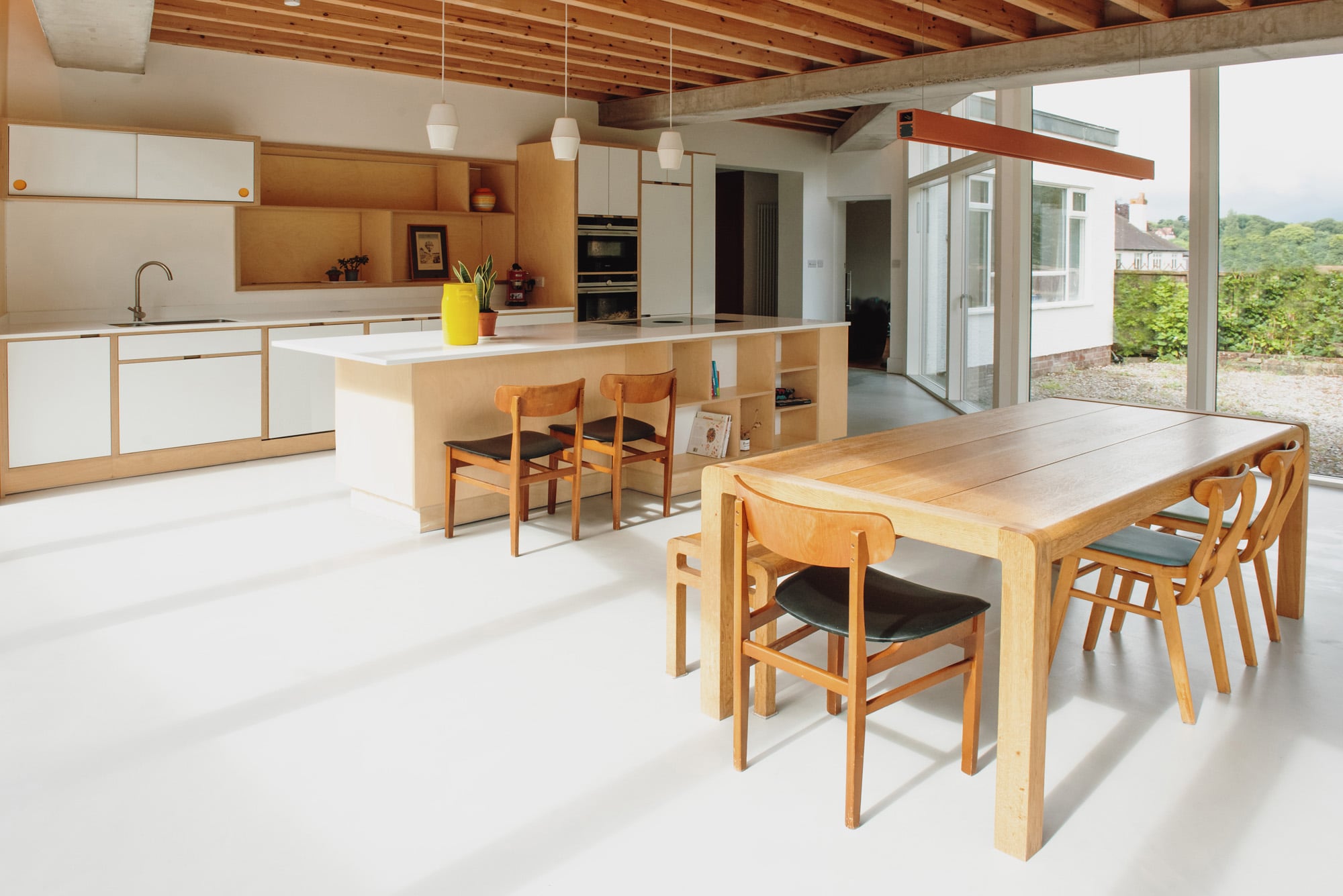 view of open plan kitchen from dining area