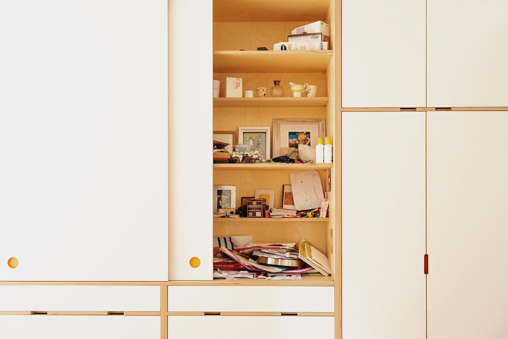 hallway storage with open door