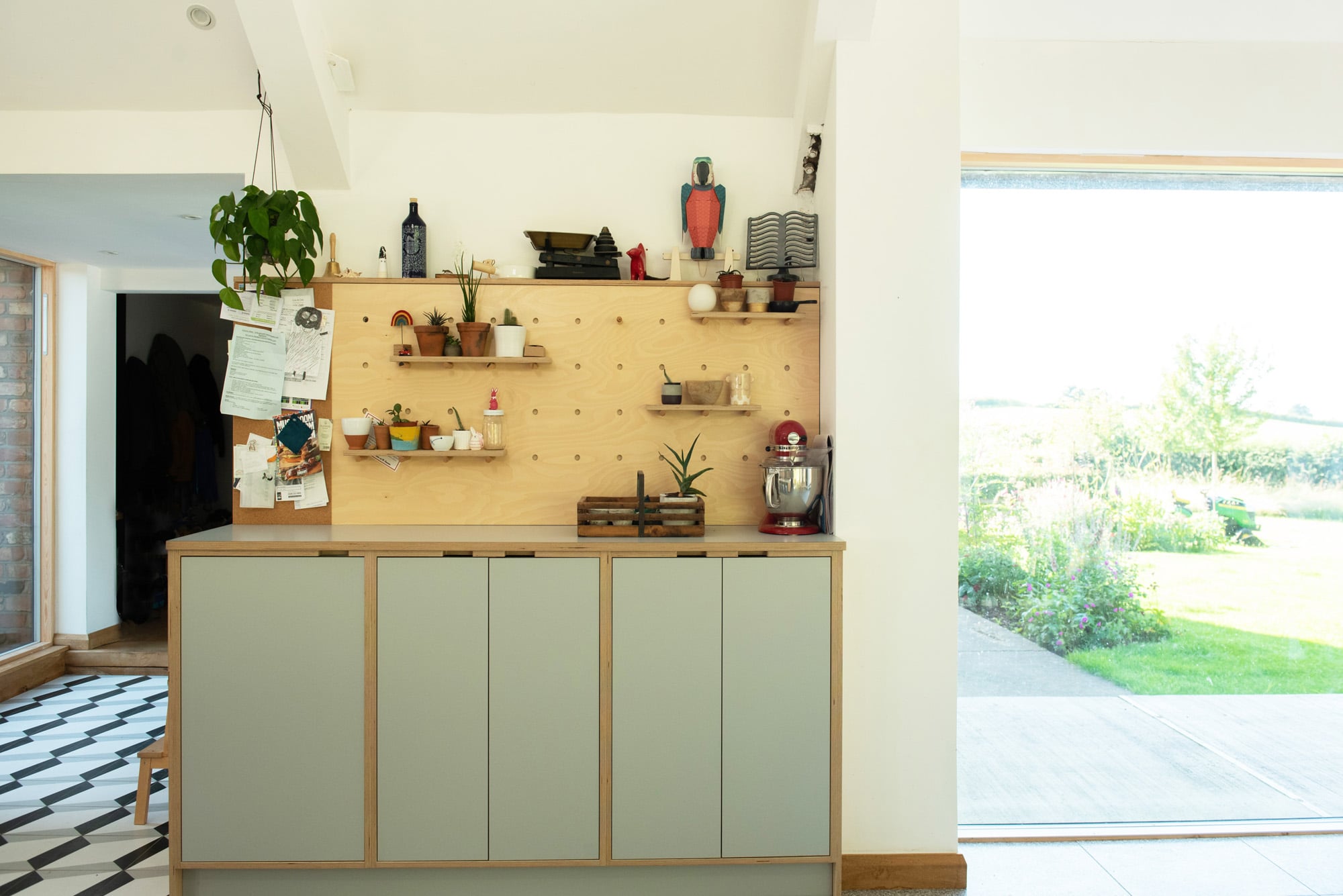 Plywood kitchen dresser with peg board 