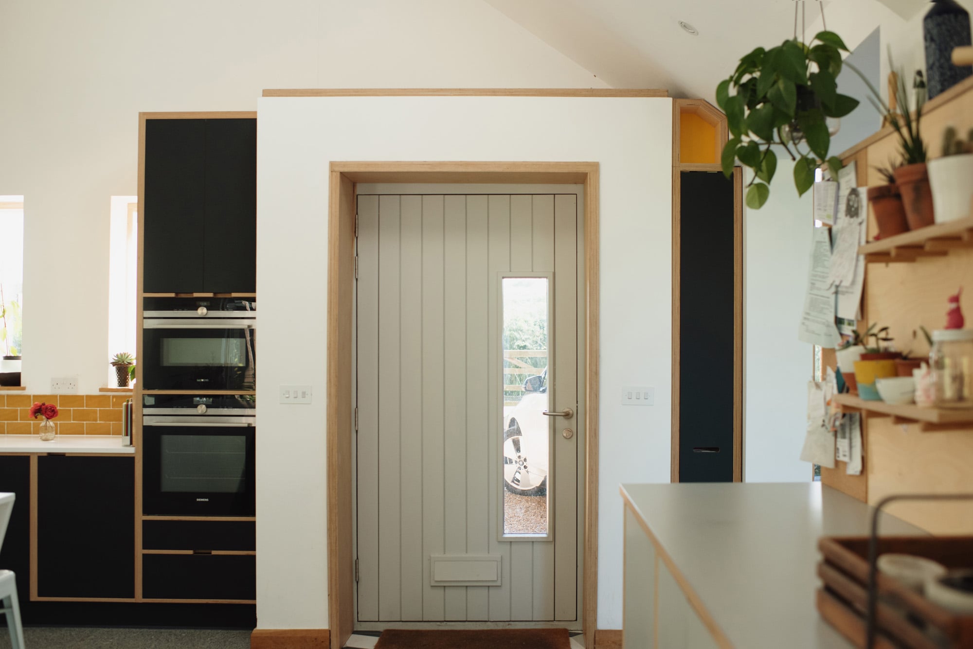 Pull out plywood bookcase in closed position