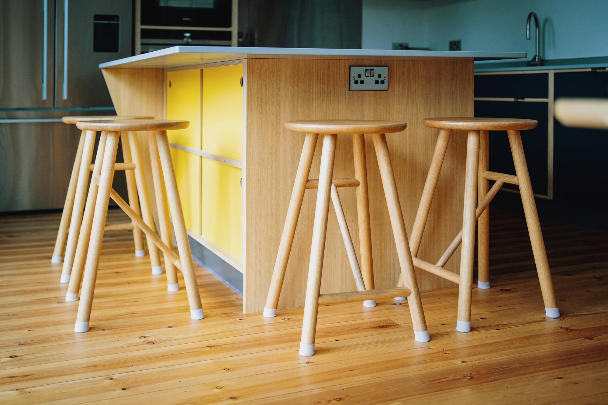 kitchen island with sloping side and sliding door storage