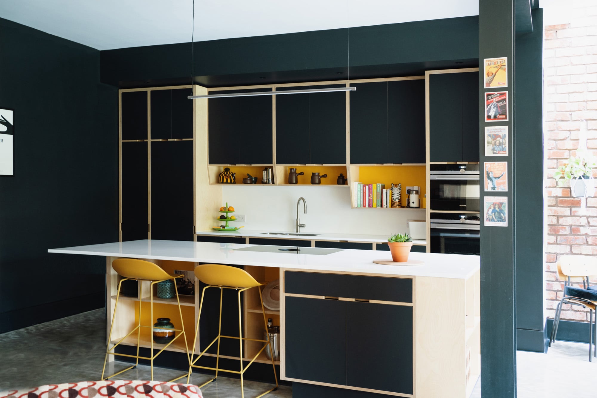 black and yellow plywood kitchen