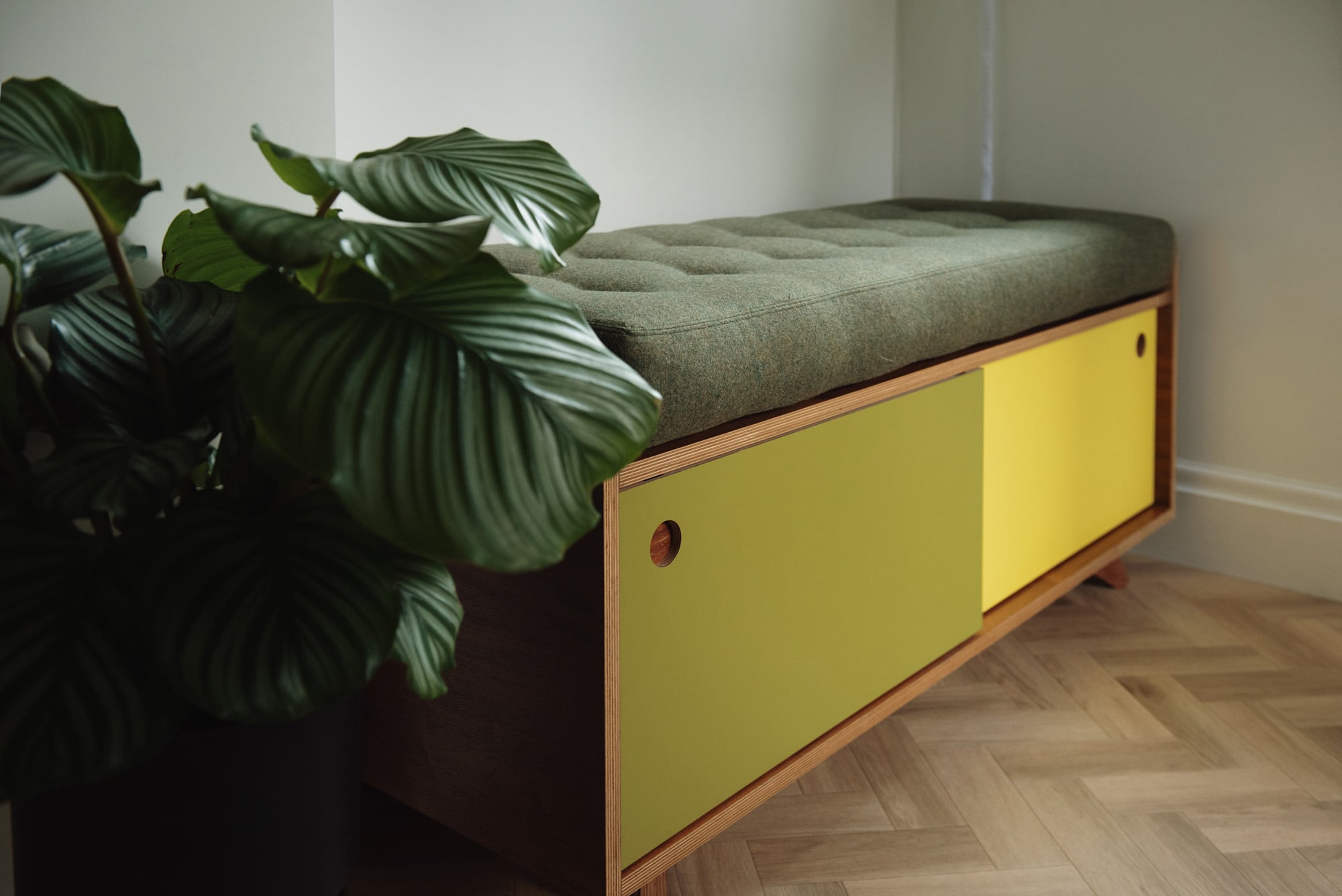 upholstered plywood bench seat in yellow and green