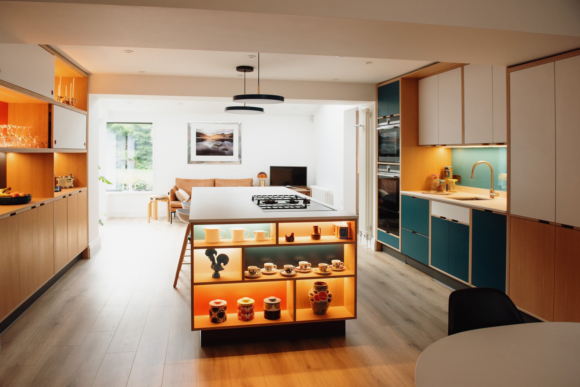 modern plywood kitchen in orange and blue