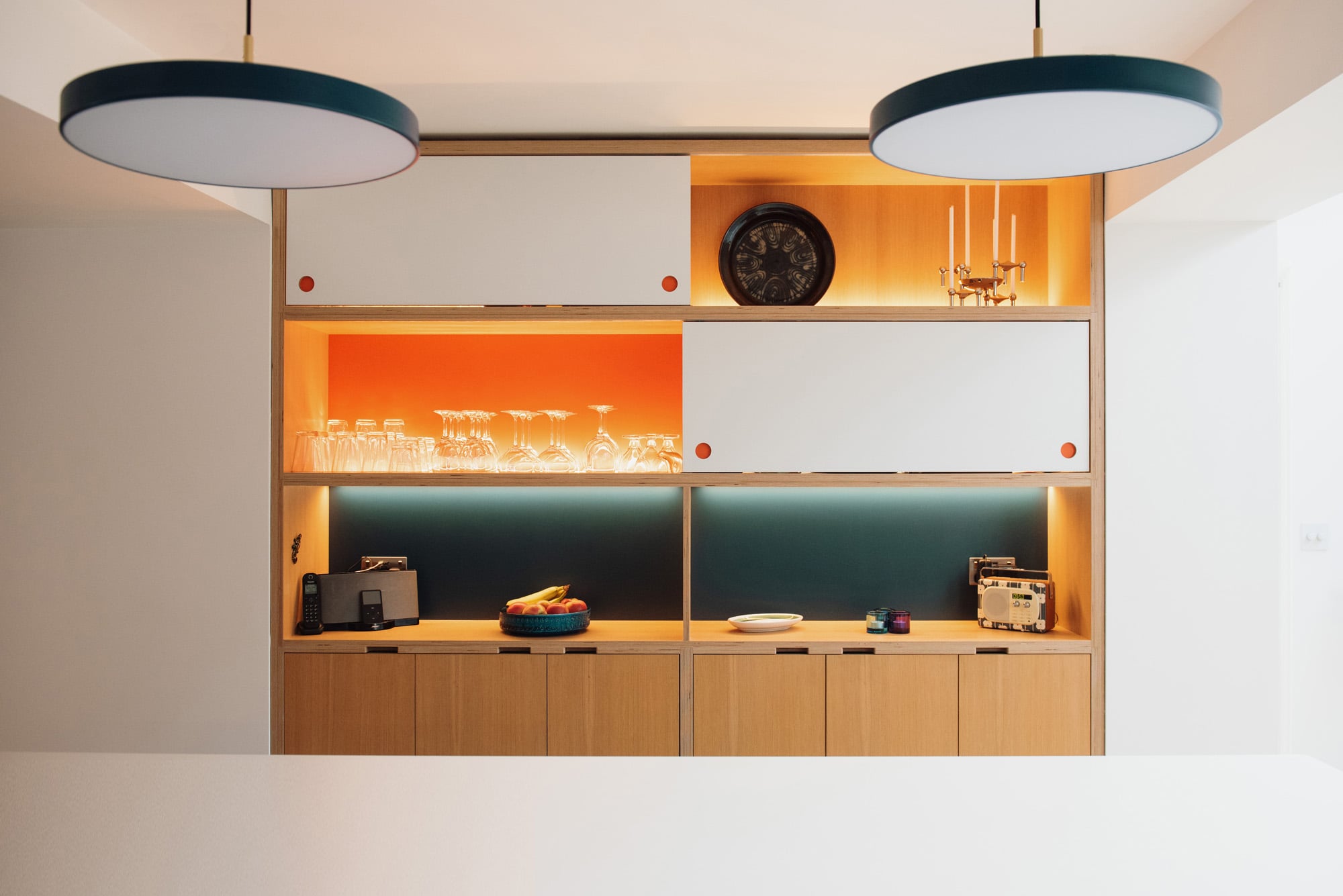 illuminated open plywood shelving