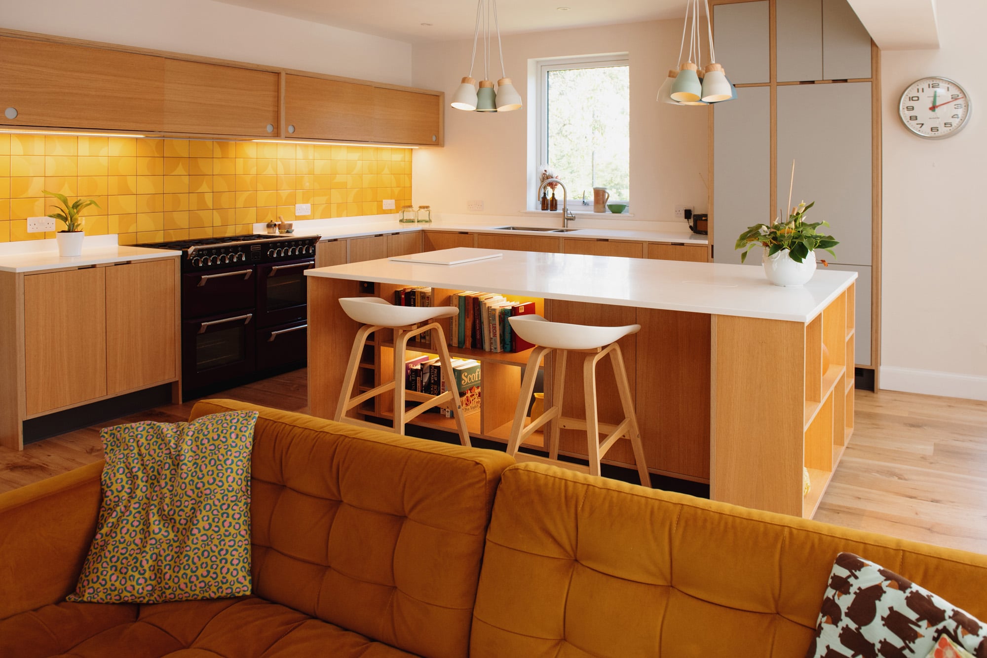 plywood kitchen with island in oak veneer and grey laminate with yellow tiles
