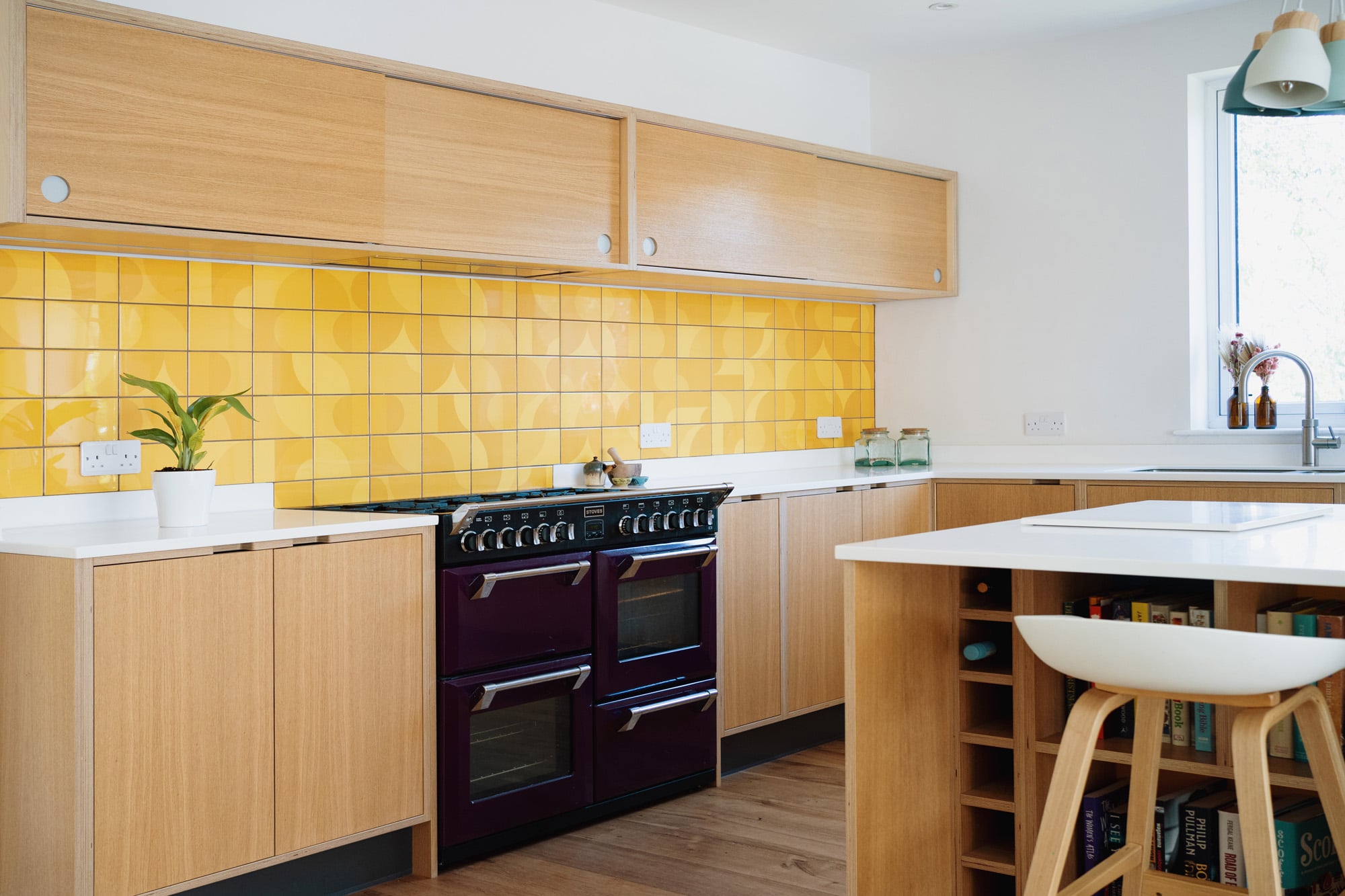 Oak veneered plywood kitchen with yellow tiles