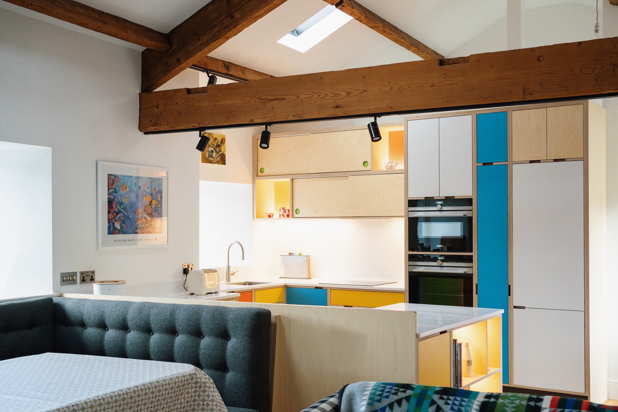 kitchen with high beams in roof