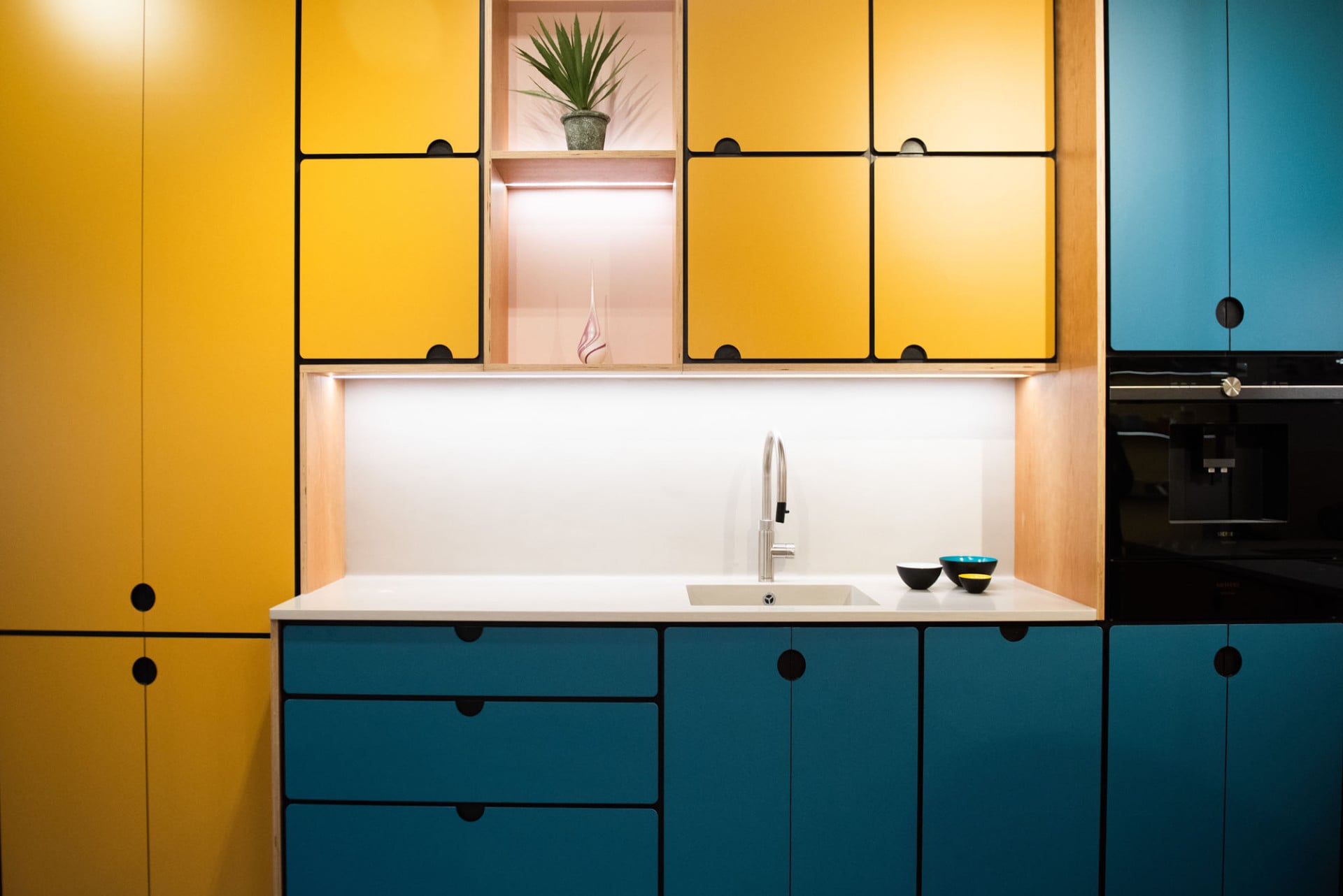 unusual kitchen scheme in yellow and blue laminated valchromat