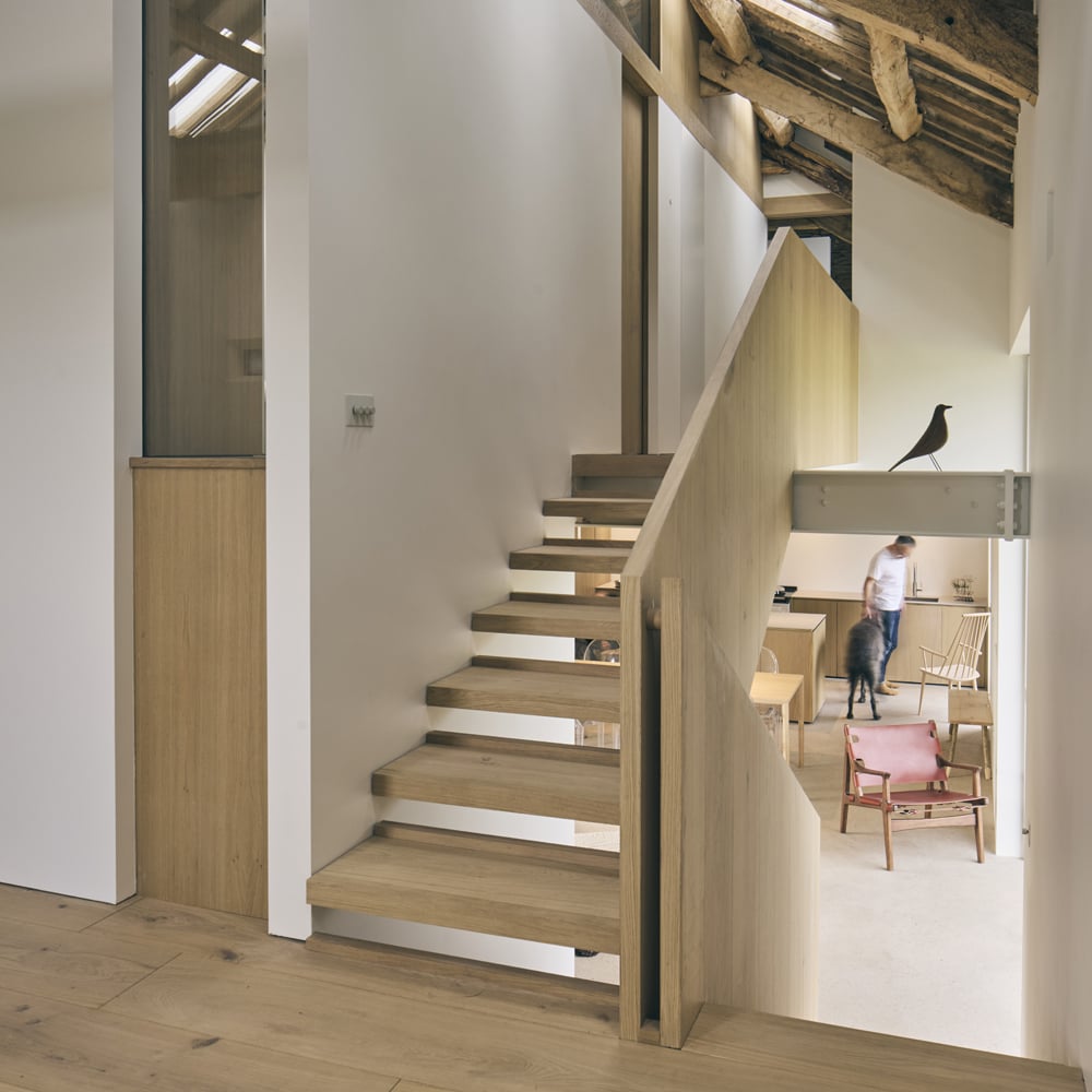 Modern staircase, open cantilevered risers, concealed stringers