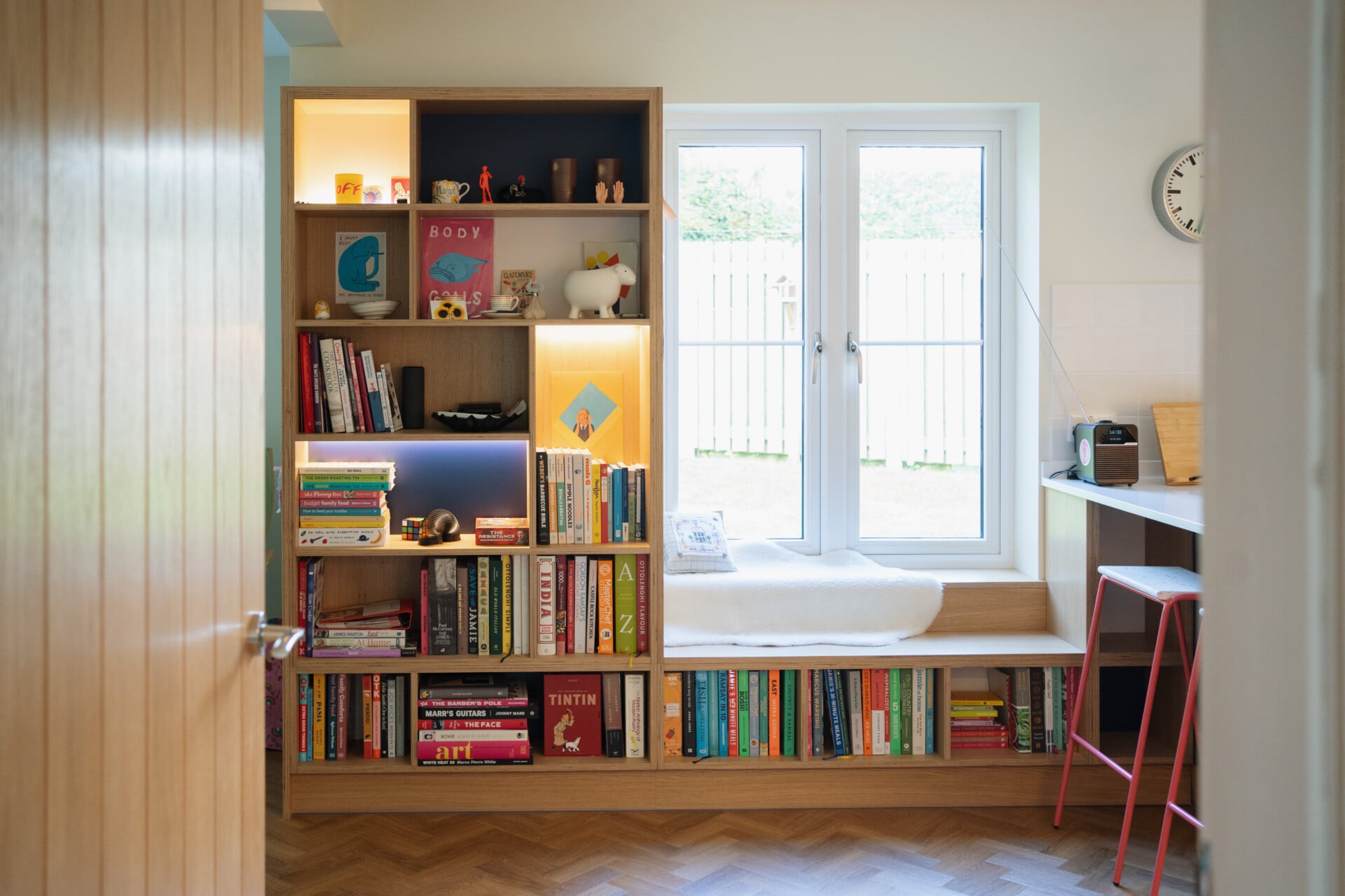 Window seat with nook, bookshelf, and breakfast bar