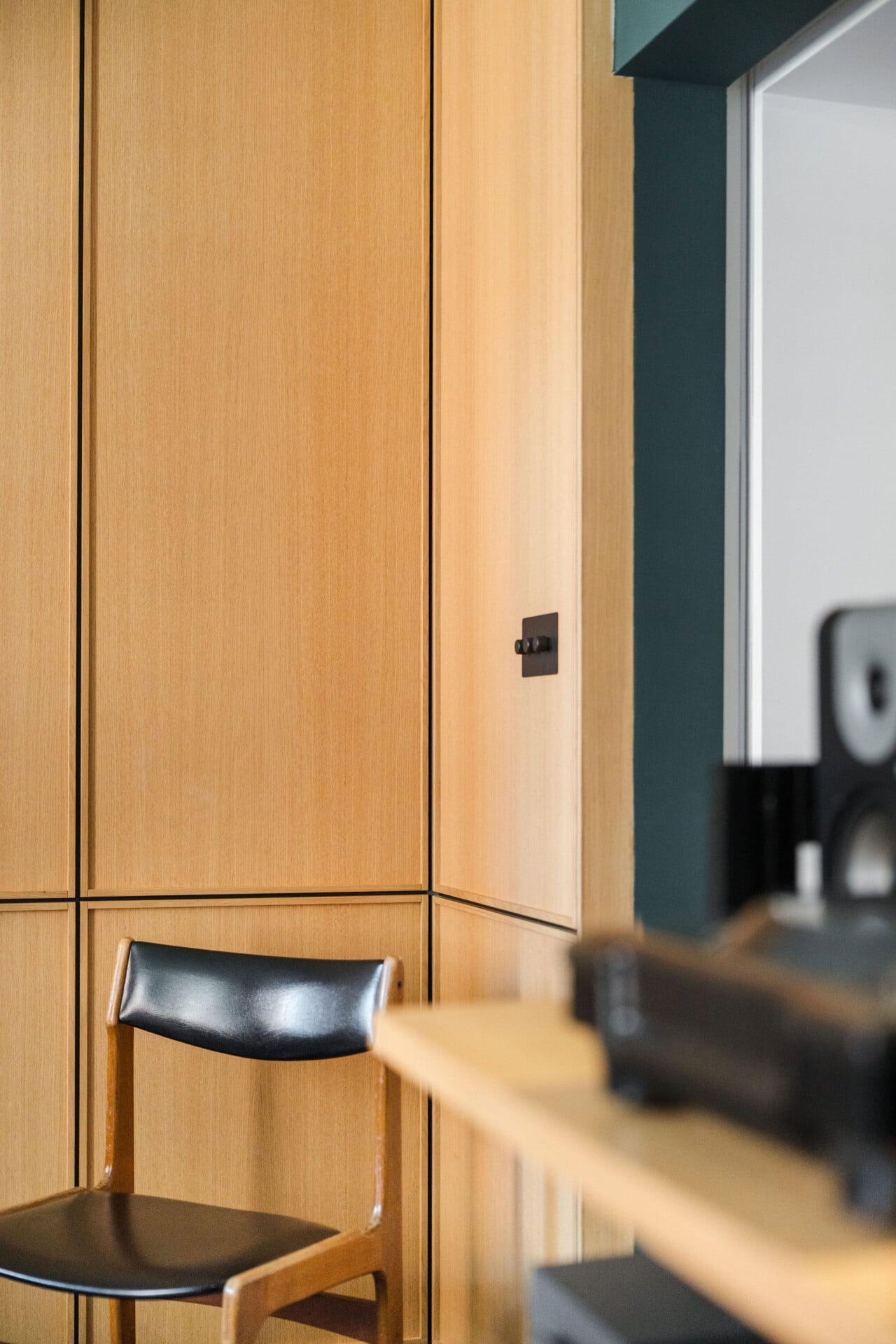 floor to ceiling bespoke fitted plywood storage