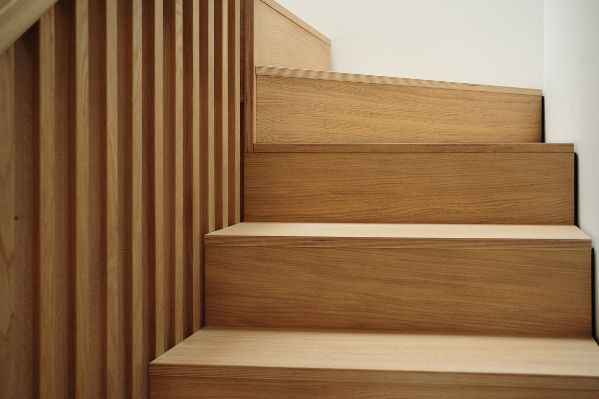 solid oak and plywood staircase with concealed riser and tread designClose-up of s