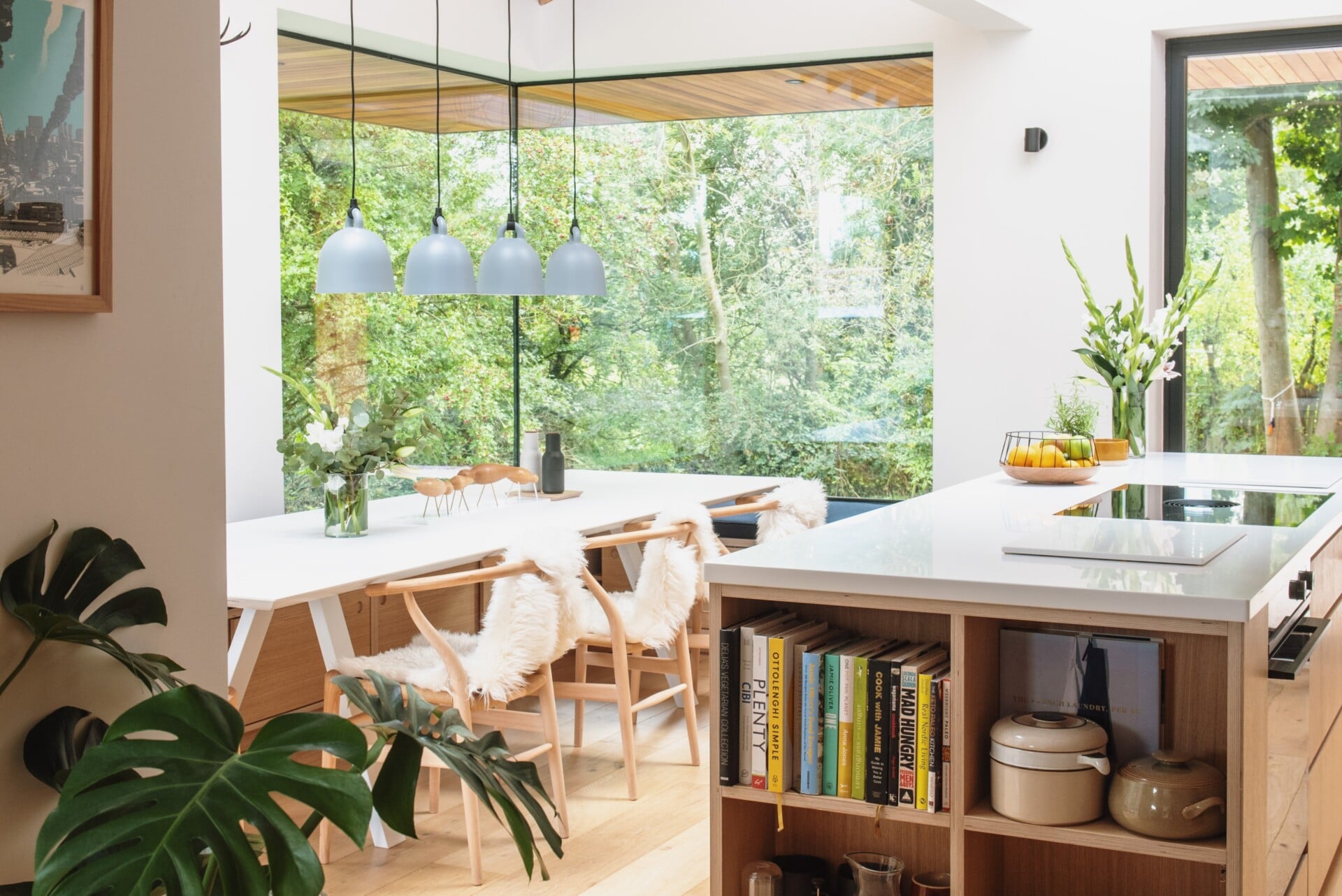 scandinavian style kitchen with floor to ceiling picture window